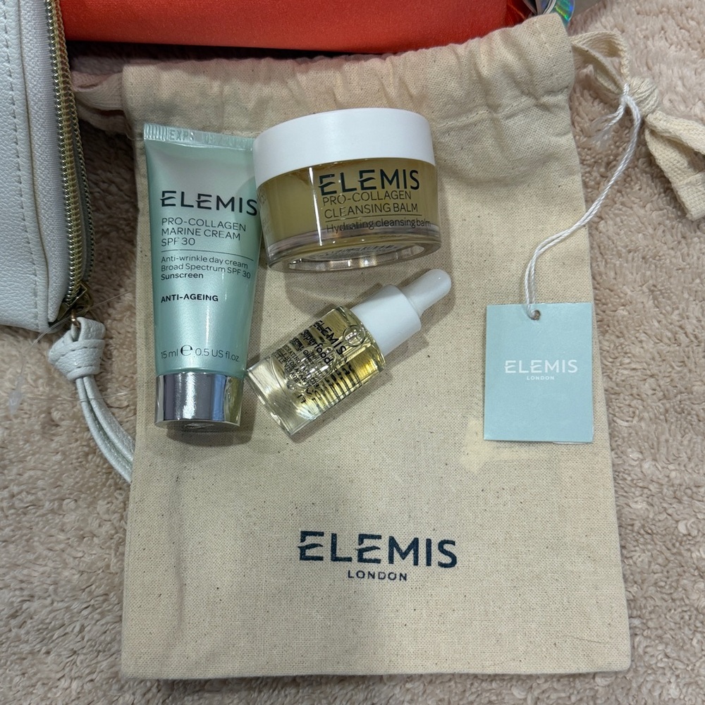 ELEMIS deluxe Skincare Collection with Orange and white Bags